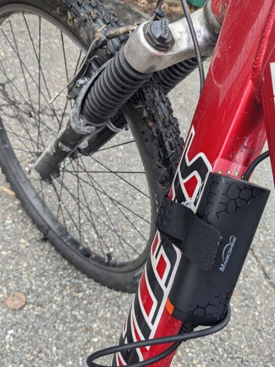 The Magicshine battery pack can be attached to the bike's frame.