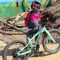 Girl standing next to her Specialized Riprock 20