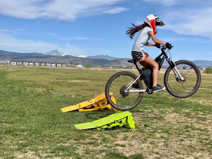Girl jumping bike on a Ninja MTB Ramp Review