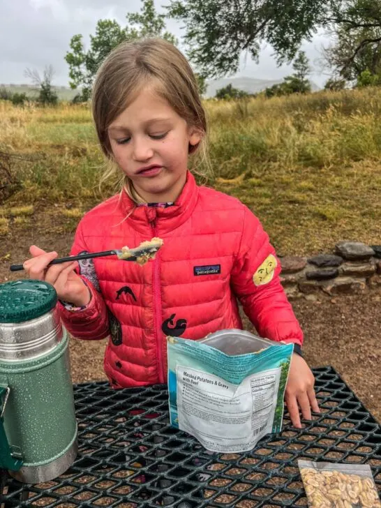 Ari making a funny fave at the backpacking food