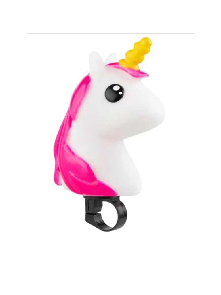A stock photo of a unicorn horn, it's white with pink hair and a golden horn